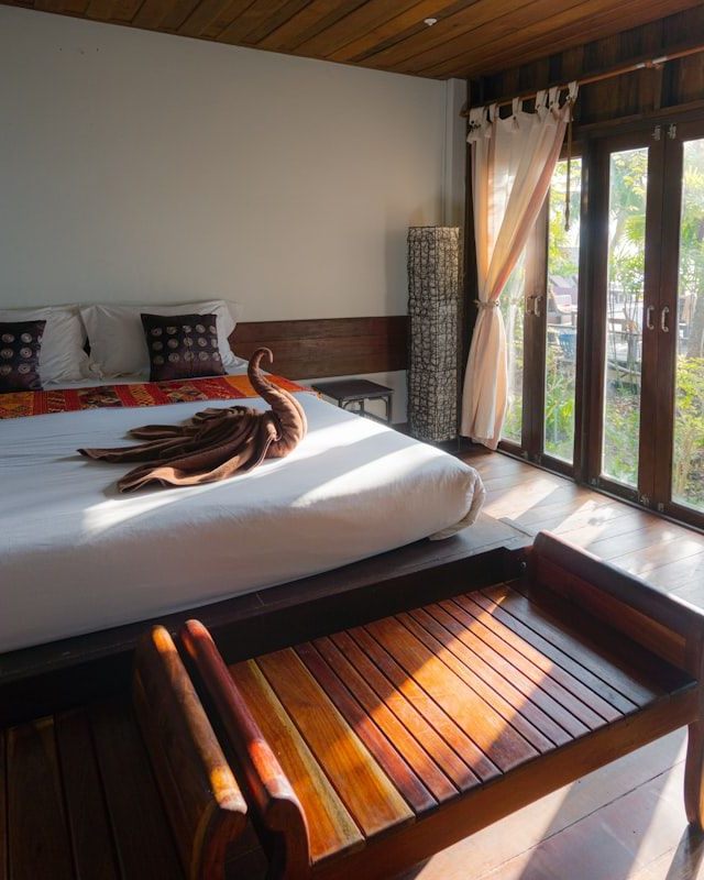 Dark walnut, a reading chair set into the window, and the ferries crossing below.